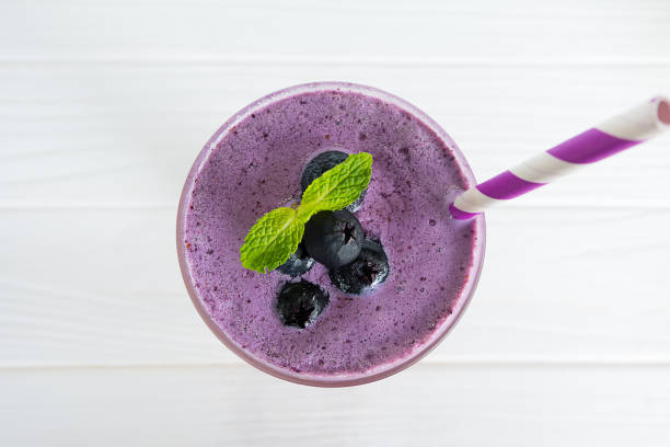 istock blueberry smoothies and blueberry fruit 884272170