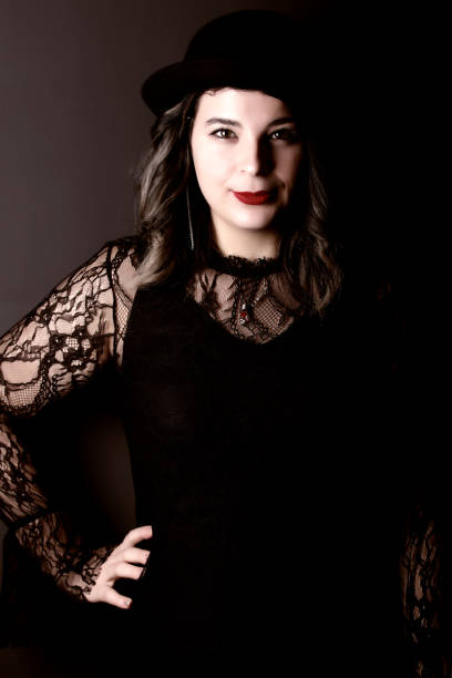 istock hipster girl black background 884273080