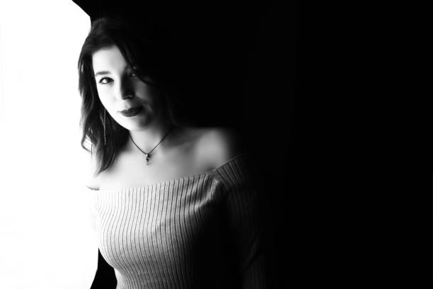 istock hipster girl black background 884273082
