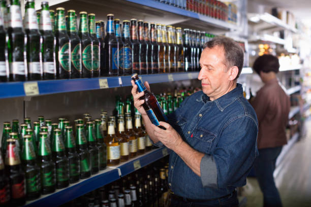 istock European selecting a beer at the grocery store 884273480