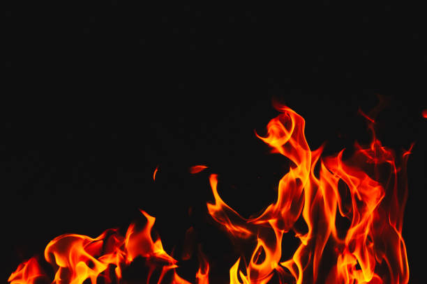 istock Red hot flames of fire isolated on black 884281842
