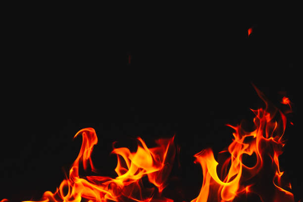 istock Red hot flames of fire isolated on black 884281868