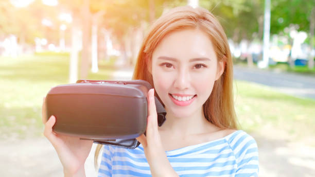 istock beauty woman use VR 884282574