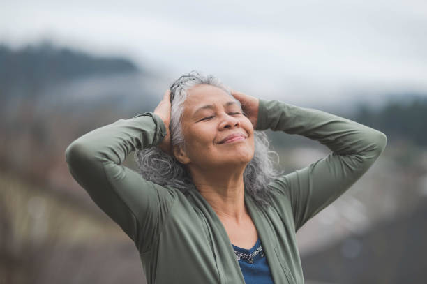istock Elderly Hawaii Woman Practicing Yoga 884298208