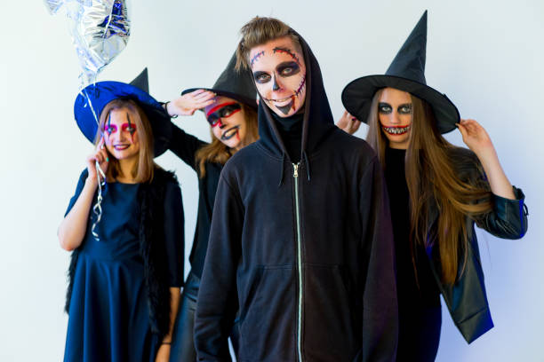 istock People in halloween costumes 884306394