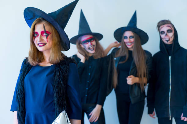 istock People in halloween costumes 884309120