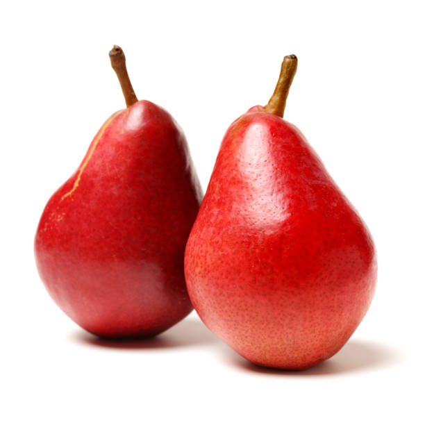 白い背景の上の新鮮な赤梨 - russet pears ストックフォトと画像