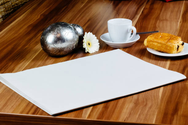 istock Blank newspaper, espresso and croissant 884338392
