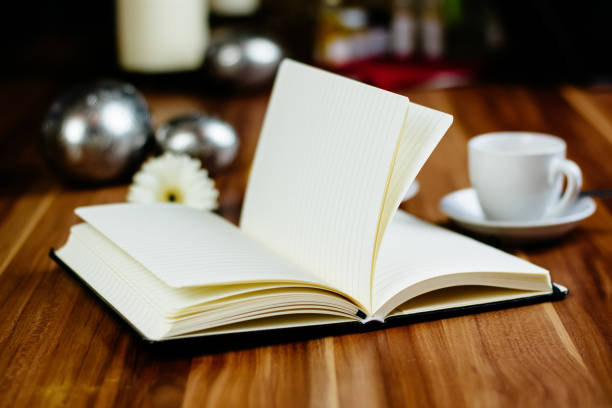 istock Notebook, pen, espresso and croissant 884341486