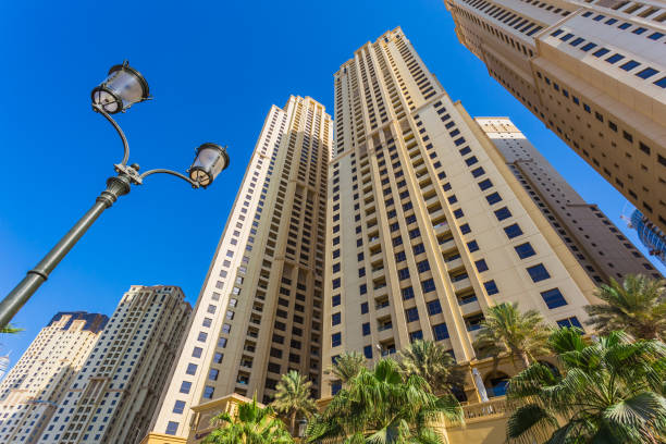 istock High rise buildings and streets in Dubai, UAE 884346652