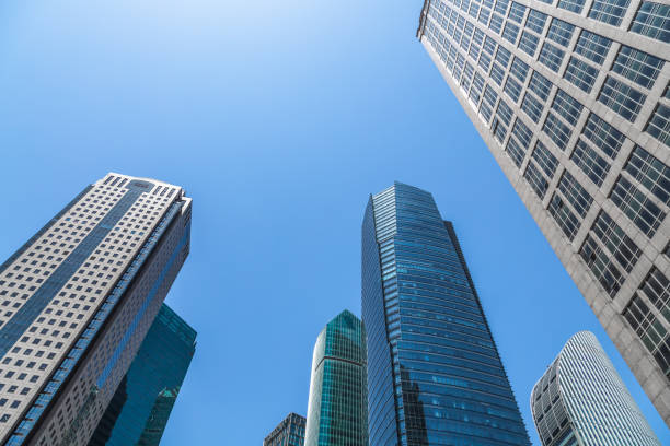 istock Low angle view of modern metallic skyscrapers 884347208