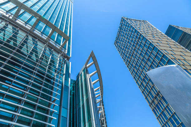 istock Low angle view of modern metallic skyscrapers 884347306