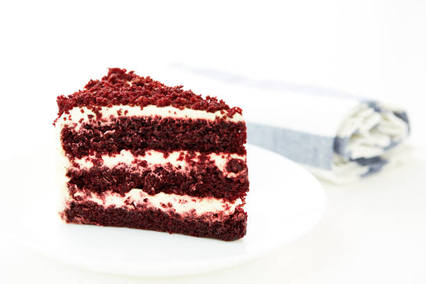 istock Red velvet cakes isolated on white background 884350190