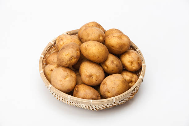 istock Harvested potatoes in a basket 884359062