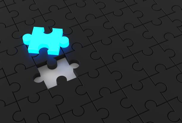 istock Black jigsaw puzzle with glowing missing piece. Business background. 3D illustrating 884365404