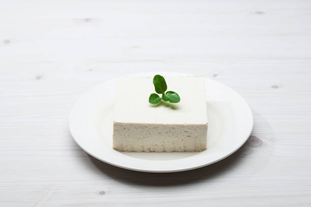 istock Tofu of made from soy beans on a plate 884371244
