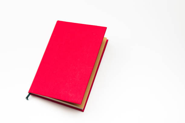istock Book with Red color covered isolated on a white 884374314