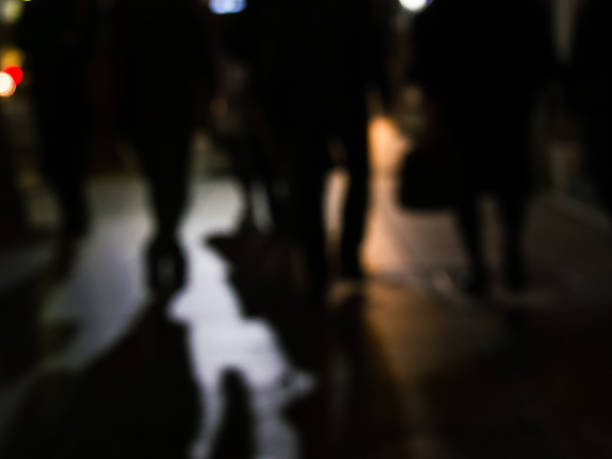 istock Defocused image of street at night 884384226