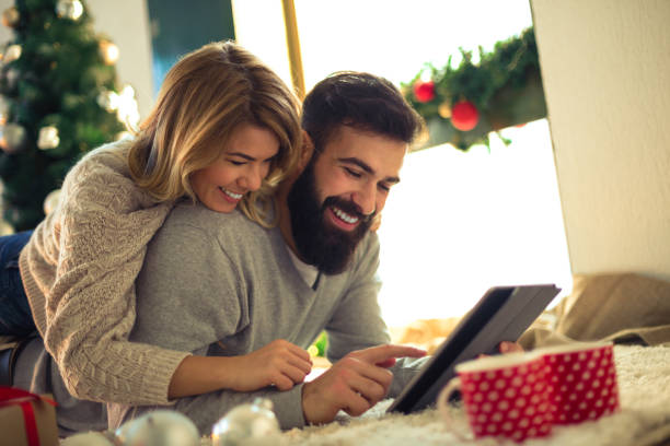 istock Beautiful couple shopping online 884387436