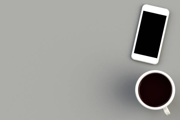 istock Coffee cup with smart phone on gray background, Top view with copyspace for your text, 3D rendering 884388658