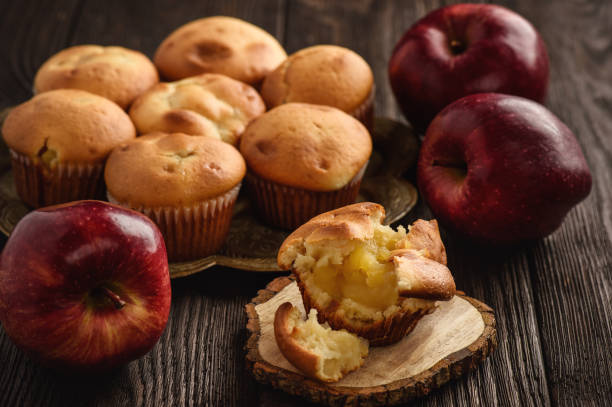 istock Homemade muffins with apple stuffing. 884391298