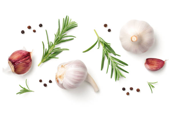 istock Garlic, Rosemary and Pepper Isolated on White Background 884391644
