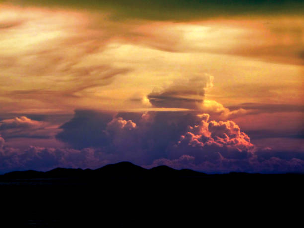 istock silhouette mountain and blur cloud in evening 884417502