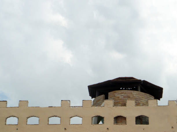 ancient brick wall fortress back on old brick wall and white cloud in the sky