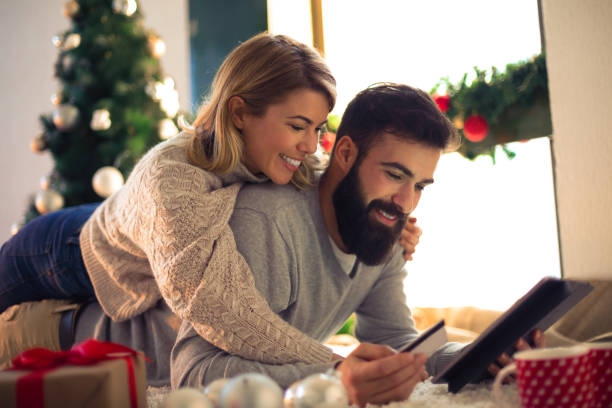 istock Beautiful couple shopping online 884431706