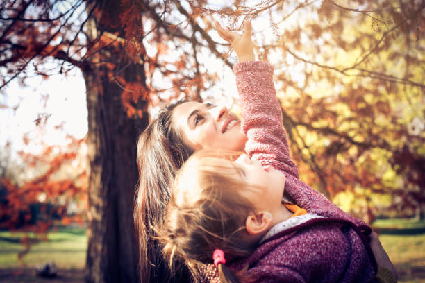 istock Happy girl with mother. 884440362