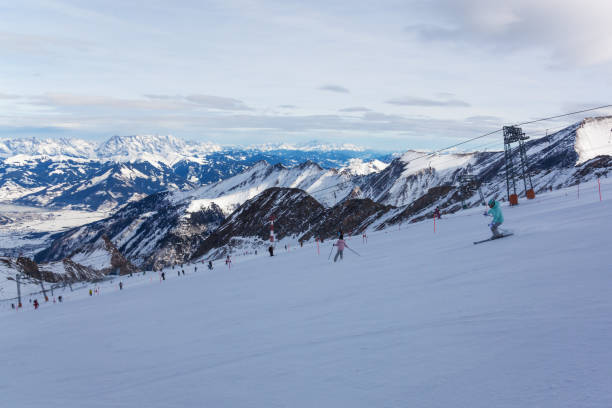 istock Ski slope and tracks in mountains 884452764