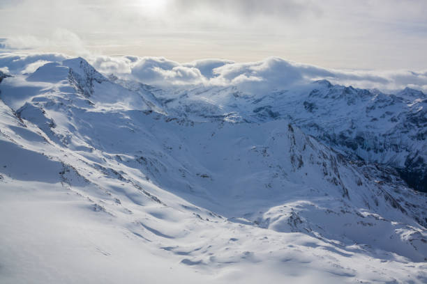 istock The mountain peaks covered with snow 884452794