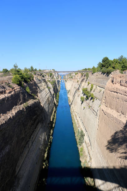 istock Corinth channel in Greece view on Aegean Sea while a ship is going to pass the channel 884453376