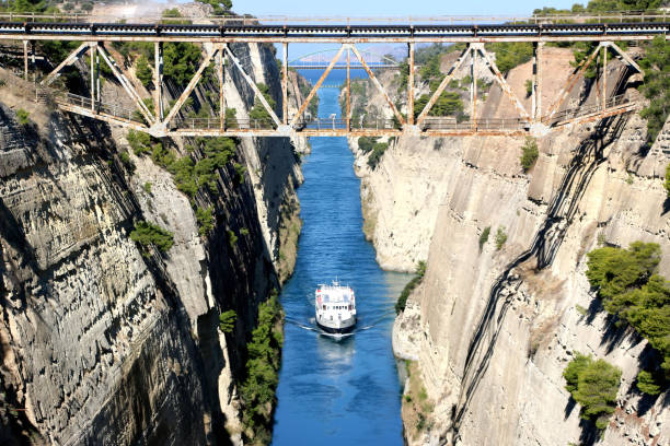 istock Corinth channel in Greece view on Aegean Sea while a ship is going to pass the channel 884453624