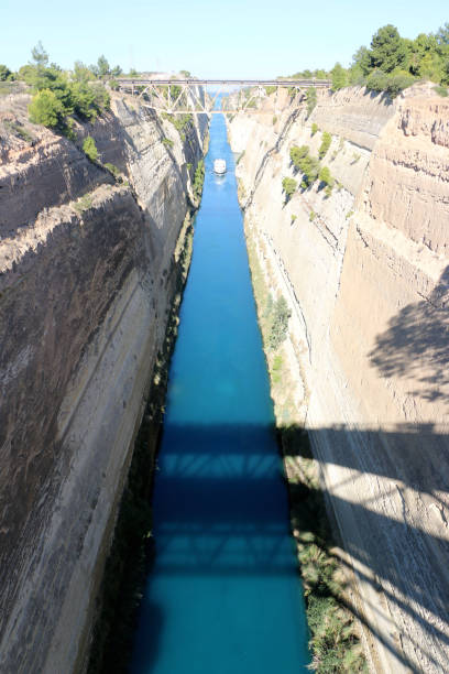istock Corinth channel in Greece view on Aegean Sea while a ship is going to pass the channel 884453680