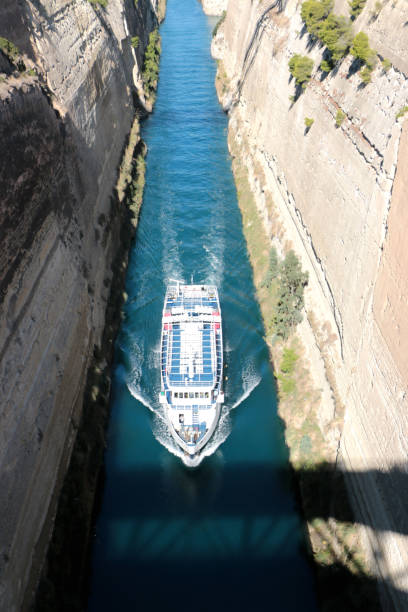 istock Corinth channel in Greece view on Aegean Sea while a ship is going to pass the channel 884453948