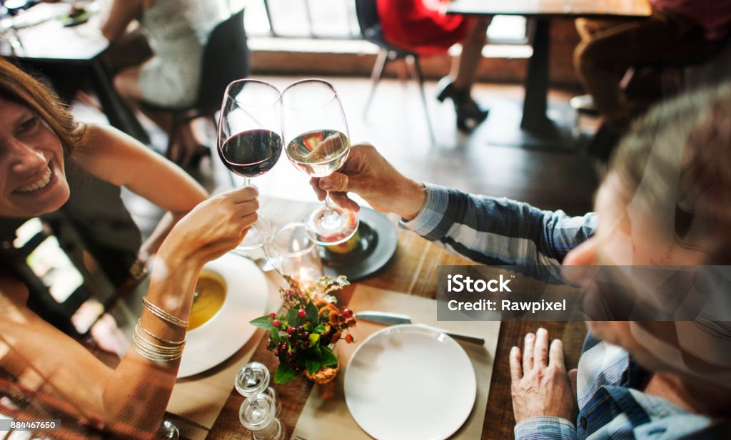 Friends at a dinner party Fine Dining Stock Photo