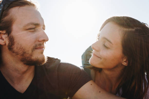 istock Couple hiking together in the wilderness 884479882