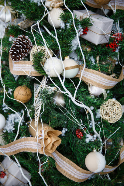 istock Christmas tree with toys and decorations in interior design 884480306