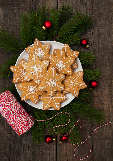 istock Christmas cookies and nuts on a plate 884483502