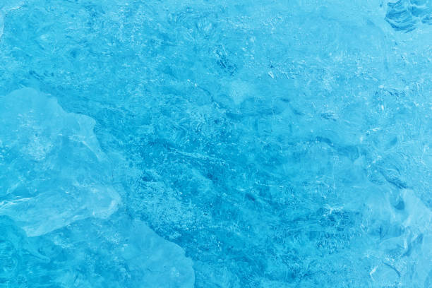 istock Texture of glacier ice in close-up detail 884486076