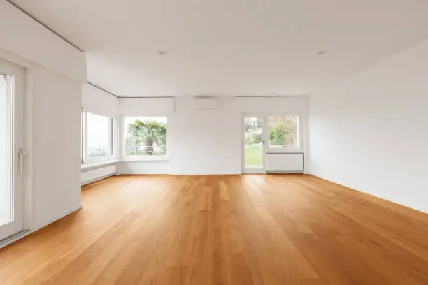 Interior of modern apartment with wooden floor