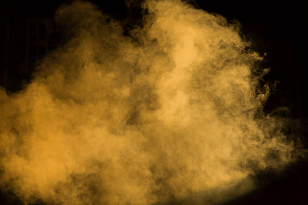 istock Yellow theatrical smoke on stage during a performance or show 884498658