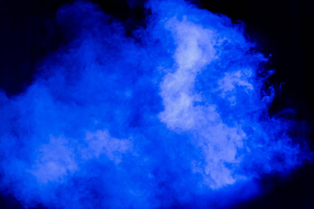 istock Blue theatrical smoke on stage during a performance or show 884498680