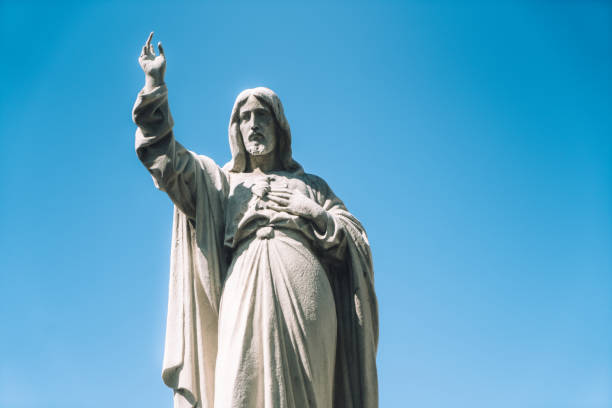 istock White marble statues at the cemetery 884498998