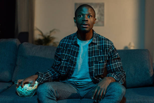 african american man watching tv