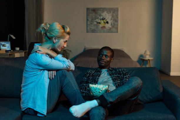 istock couple looking at each other at home 884502442