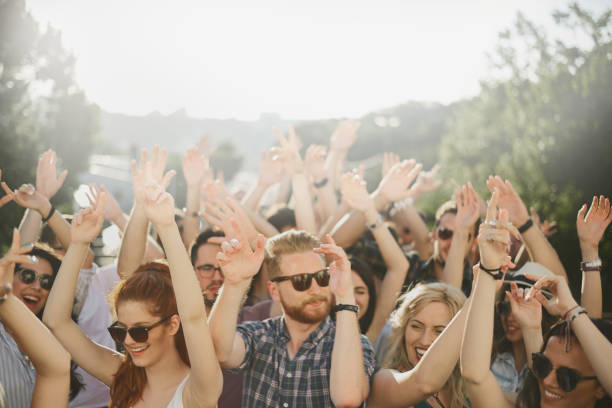 istock Group of people dancing at the party 884503082