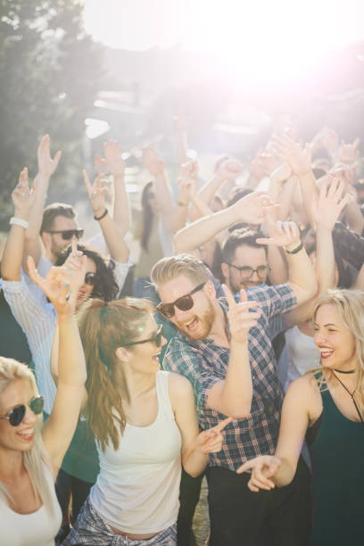 istock Group of people dancing at the party 884503088