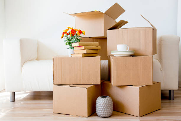 istock Cardboard boxes - moving to a new house 884518238
